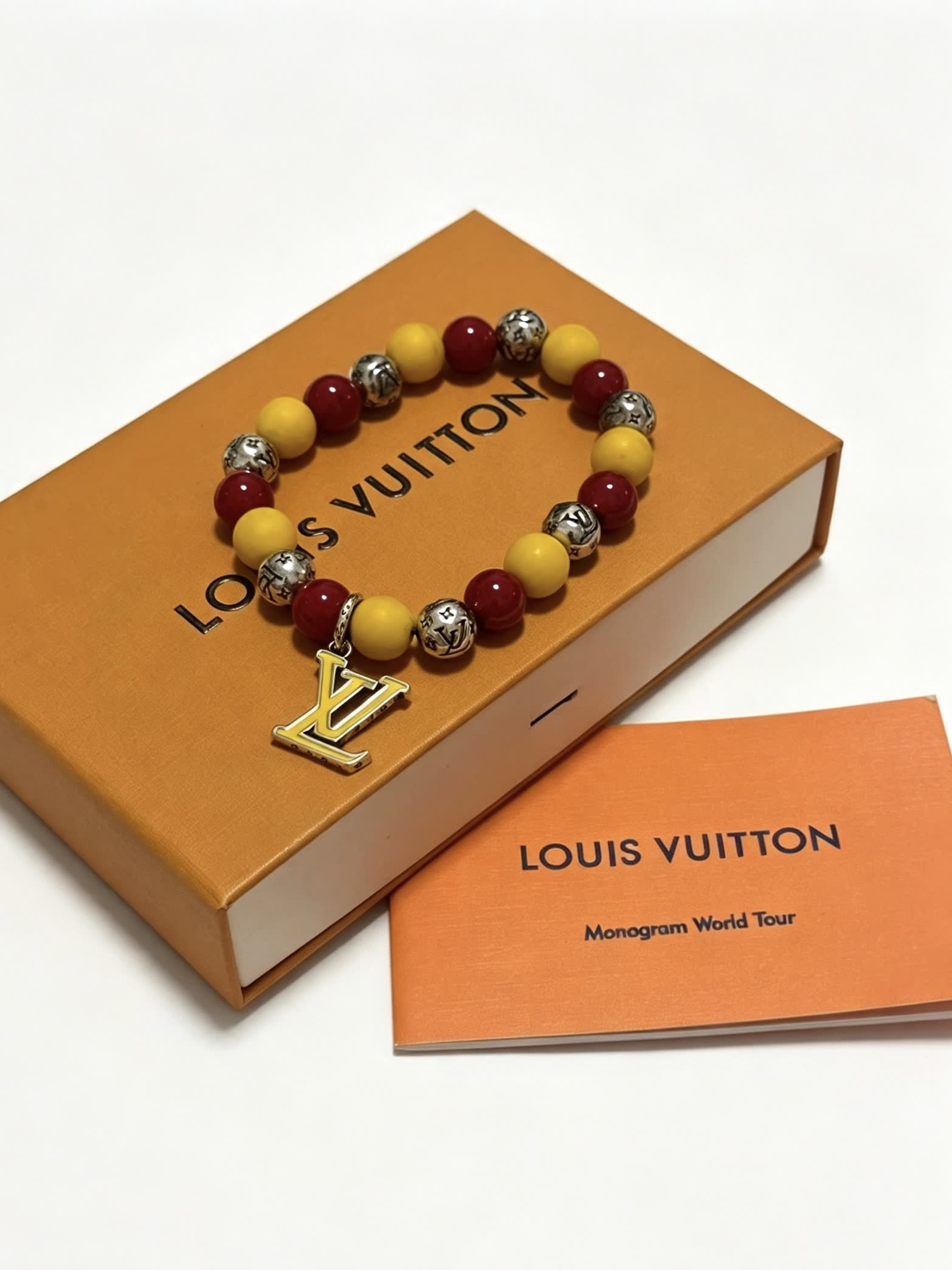 Louis Vuitton Beaded Bracelet with Monogram Charm Louis Vuitton Beaded Bracelet with Monogram Charm